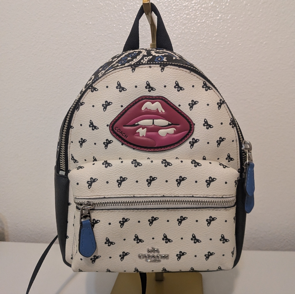 Coach Cream And Black Mini Backpack With Pink Lip Patch